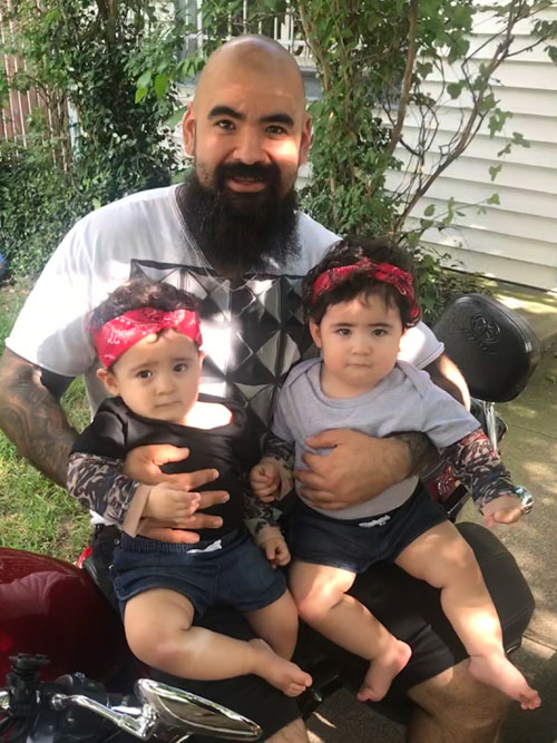 Mariela's brother Javier with the twins